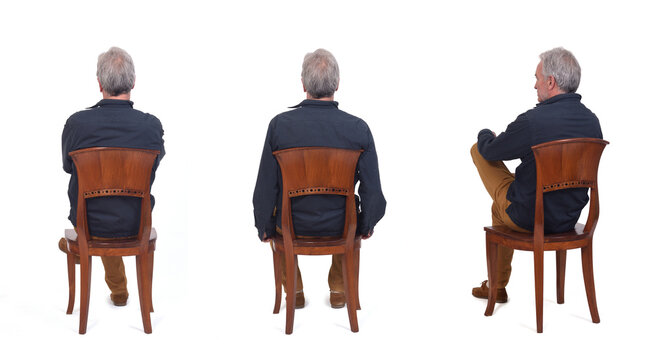 Back View Of Same Man Sitting On Chair On White Background