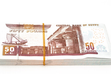 A pile of Egyptian money banknotes of 50 LE fifty pounds series 2022 features Abu Hurayba Mosque on...