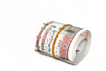 Egypt money roll pounds isolated on white background, 50 LE fifty Egyptian pounds cash money bills...