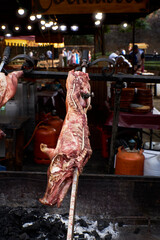 View of the preparation of a pig on a restaurant grill