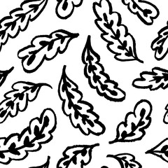 Bold oak leaves with veins seamless pattern. Hand drawn sketchy style leaves. Charcoal or pencil drawing. Simple abstract botanical print in grunge style. Black and white foliage vector ornament.