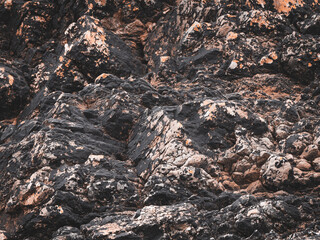 Beautiful rock deposits as a background. Stone layers close-up, full frame.