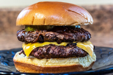 Double grilled cheese burger on brioche bun