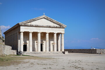 The old Venetian fortress of Corfu town and Holy Church of Saint George, Corfu, Greece. The Old Fortress of Corfu is a Venetian fortress in the city of Corfu. Venetian Old Fortress