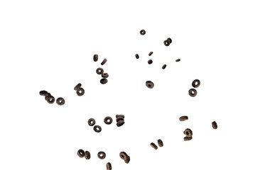 Chocolate rings cereal spill out into a bowl. Breakfast.