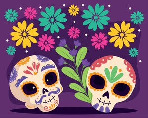 dia de los muertos skulls with floral pattern