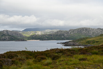 View of Little Loch Broom, sea bay on the west coast of Scotland, Highland, with mountains in the background Landscape