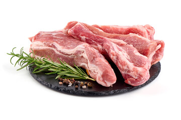 Pork fillet tenderloin with rosemary, raw meat, close-up, isolated on white background.
