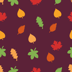 Autumn leaves. Simple seamless pattern on a dark background.
