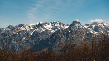 panoramic view of the central massif of the picos de europa national park, spain. landscape of snowy mountains on a clear day