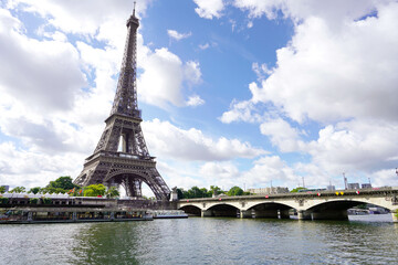 Fototapeta na wymiar The Eiffel Tower and Pont d'Iena bridge on the Seine in Paris, France