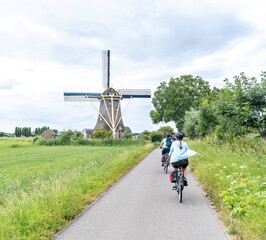 Fall bike ride in the Netherlands with a windmill