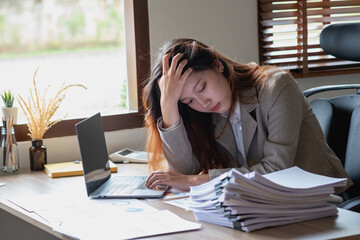 Concept Burnout Syndrome. Business Woman feels uncomfortable working. Which is caused by stress,...