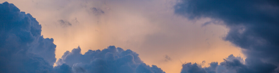 Heavenly sunset panorama. Landscape of the power of heaven and nature. Colorful and dramatic colors. Great, beautiful sky. Copy space