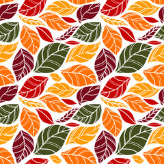 Seamless autumn pattern of leaves. Orange. Green red. Autumn. Textile. Colored autumn background. Autumn leaves.