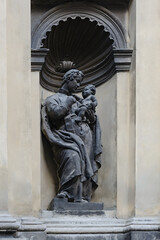 Fototapeta na wymiar Sculpture on an old building facade in Lviv, Ukraine 