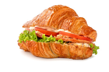 Croissant sandwich with ham, lettuce, tomatoes isolated on white background. Healthy and fast food.