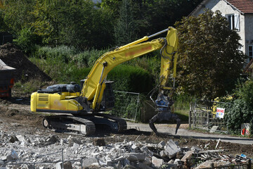 pelleteuse mecanique sur un chantier de terrassement