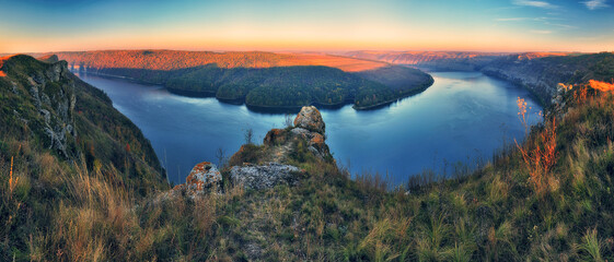Beautiful autumn landscape at sunrise. picturesque river canyon. nature of Ukraine
