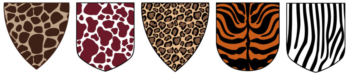Shields with animal skins. Vector icon set. Giraffe, cow, leopard, tiger and zebra