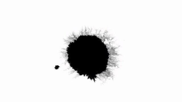 Ink Blot Blemish Leaking and Spreading over Paper in Black and White