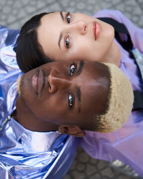 Futuristic portrait of a mixed race fashion couple