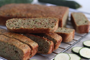 Whole wheat zucchini bread slices. Moist and dense bread made of whole wheat flour and shredded zucchini.