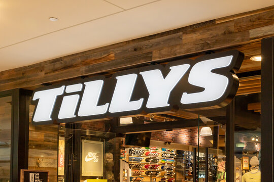Houston, Texas, USA - February 25, 2022: Close up of Tillys store sign in a shopping mall. Tillys is an American retail clothing company. 