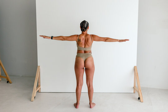 Rear view of woman with arms outstretched