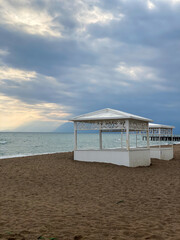 Pergolas on the beach in the Mediterranean