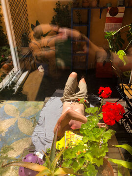 UGC man resting in the garden on a spring sunny day