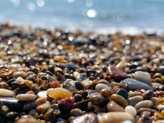 Beautiful small pebbles on the sea