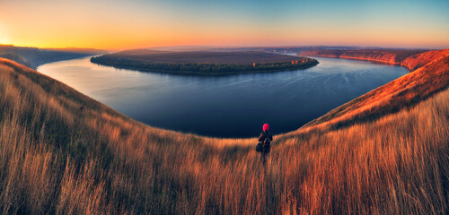 Young woman enjoying the beauty of nature in a picturesque canyon. Landscape of Ukraine