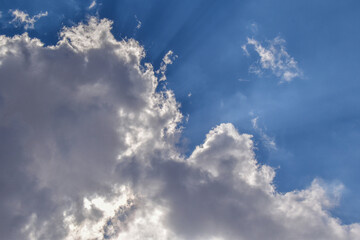 Blue sky with clouds background.  Fluffy clouds and blue sky with sunlight background.  