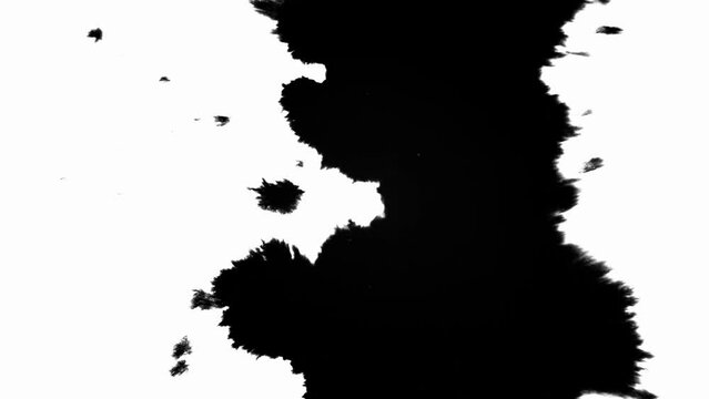 Ink Blot Blemish Leaking and Spreading over Paper in Black and White