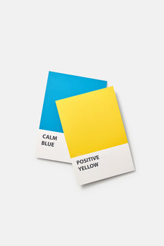 Blue and yellow fashion color swatches on white background.
