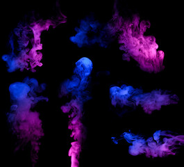 Clouds of colorful neon blue and purple smoke puffs design elements isolated on black background
