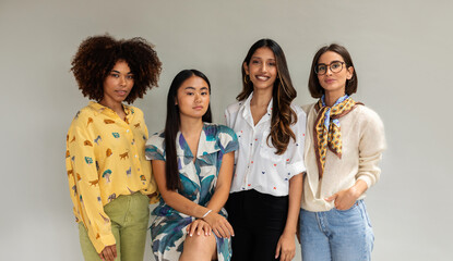 Diverse female coworkers studio portrait