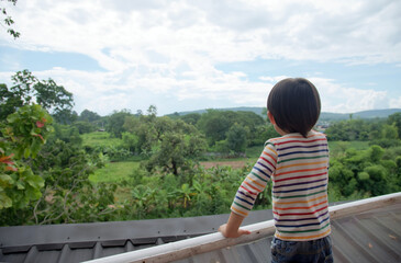 A preschooler looking view from the balcony