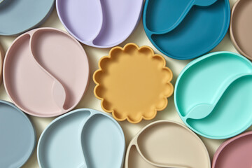 Kid plate in shape of sun with other colored ones