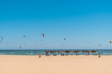 Kitesurf sport on the Caños de Meca beach on the Costa de la Luz, Cadiz. Andalusia