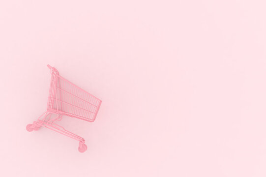 Pastel Pink Shopping Cart On Pink Background. Black Friday Sales Minimalistic Concept. Shop Online, Free Delivery, Cybermonday, Discounts, St. Valentines And International Women's Day