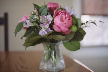 Pink peonies in a vase still life 