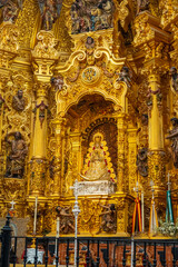 Fototapeta na wymiar Detail of the interior of the church and the virgin in the sanctuary of El Rocio. Huelva. Andalusia