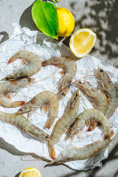Raw shrimp on a sheet of paper
