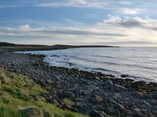 The rocky shoreline of Northern Iceland