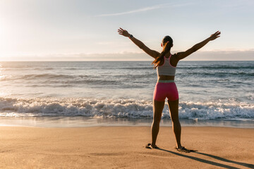 Fitness woman on the beach