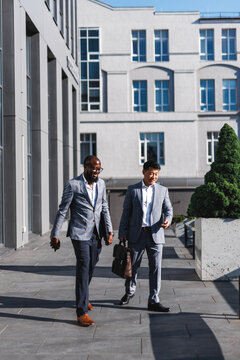 Businessmen walking on street 