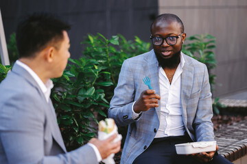Worker talking with colleague over lunch