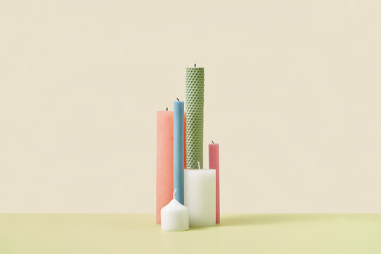 Natural multi-colored candles in various shapes.